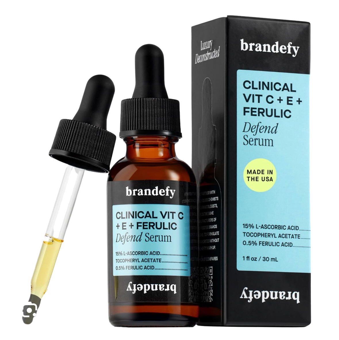 Bottle of skincare serum labeled 'brandfey Clinical Vit C + E + Ferulic Defend Serum' with dropper and box, showing ingredients like ascorbic acid, tocopheryl acetate, ferulic acid, made in USA.