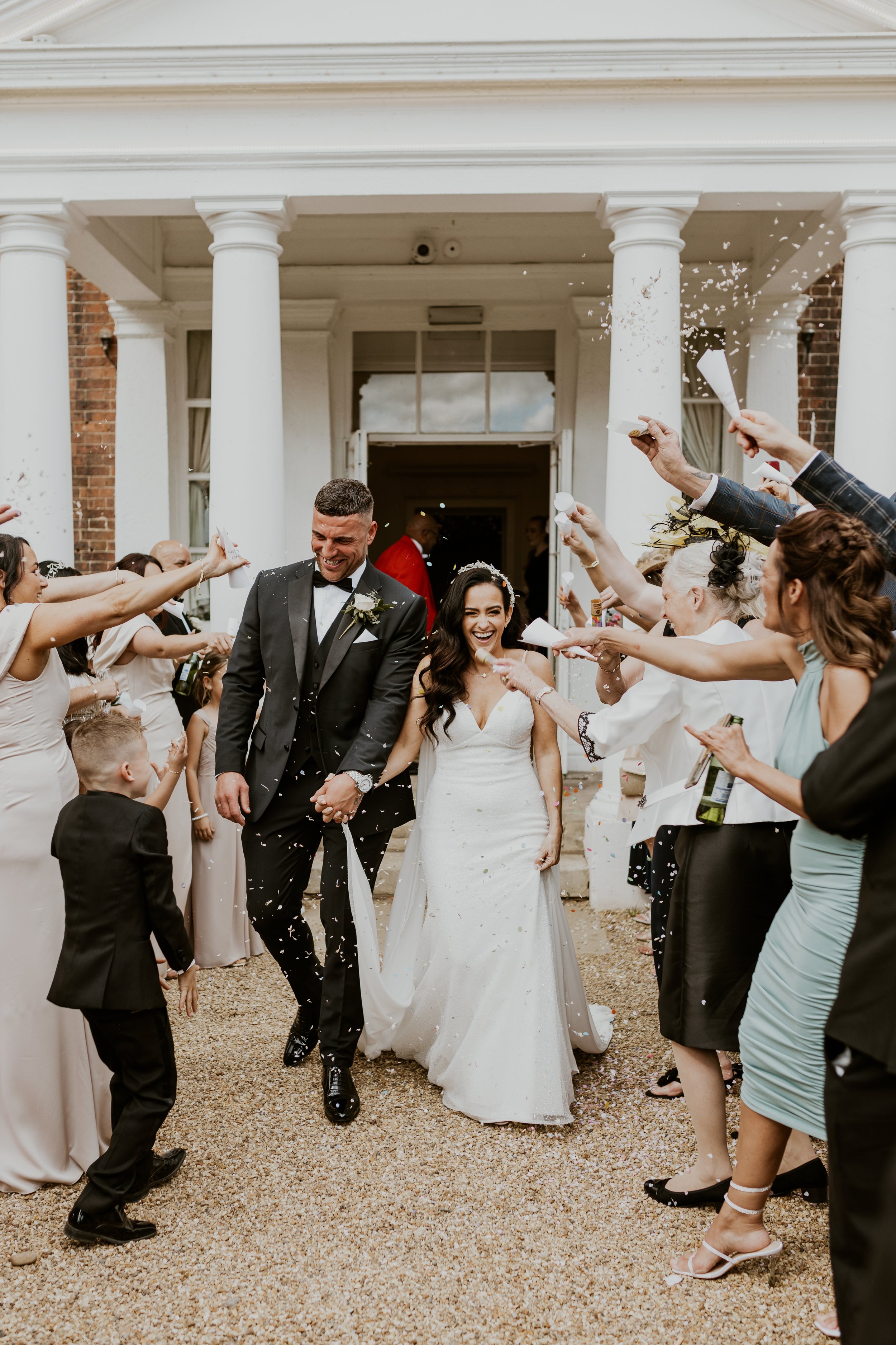 Fun and stylish confetti photo of bride and groom at Bawtry Hall 