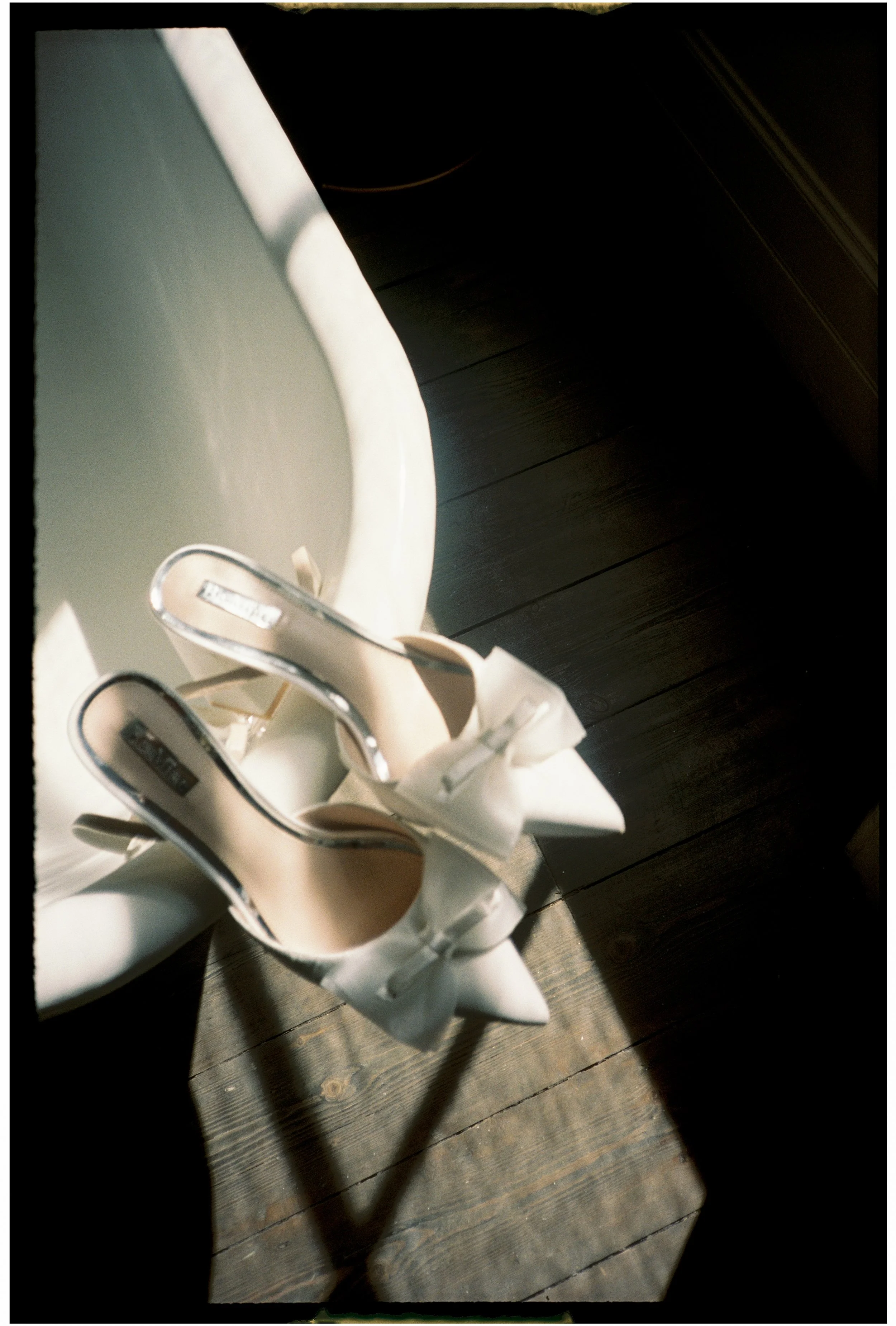  Bridal shoes photographed on 35mm film with soft focus and organic texture 