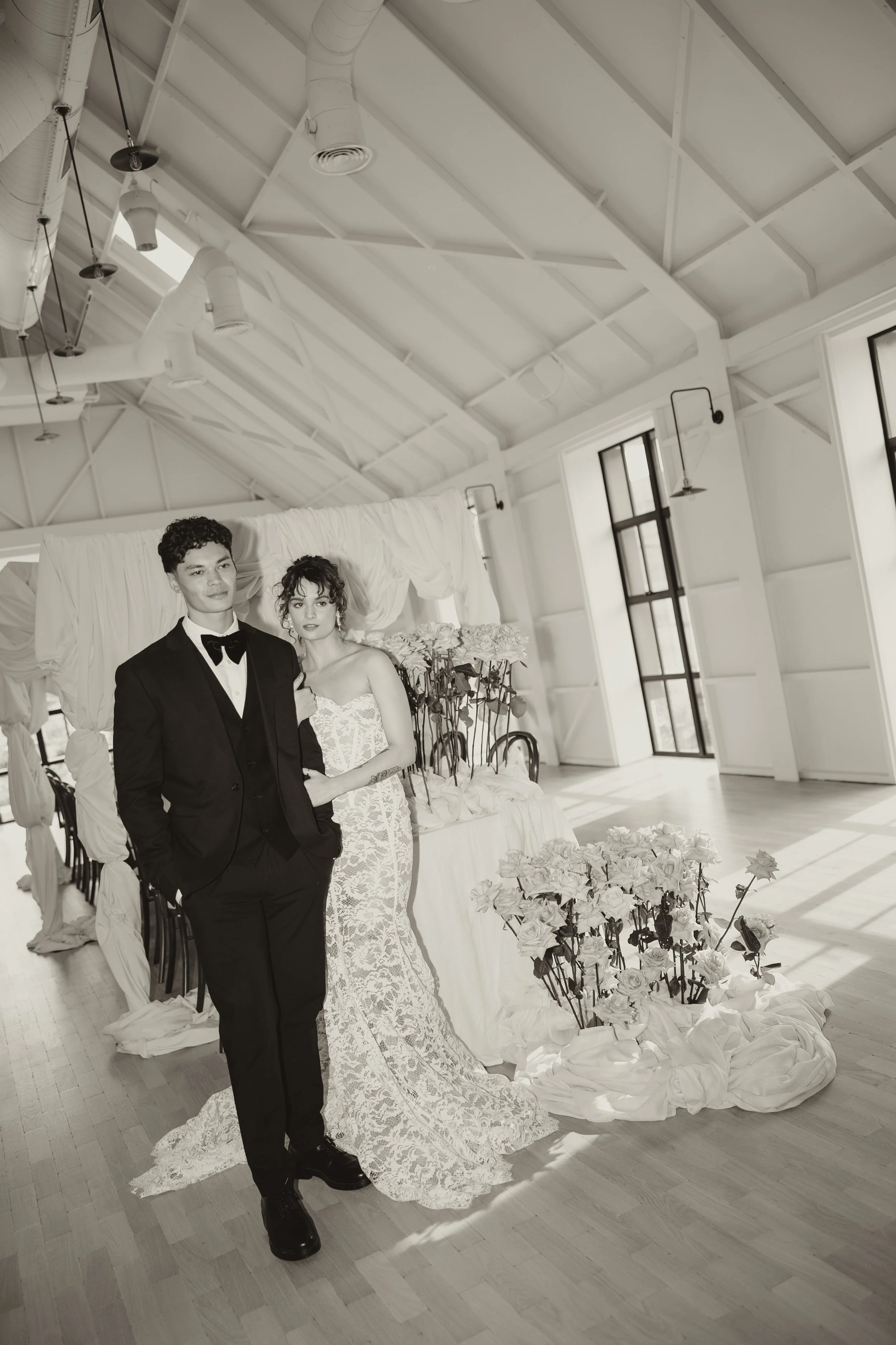 Editorial bride and groom posing at LIMEKILN wedding venue in Sussex
