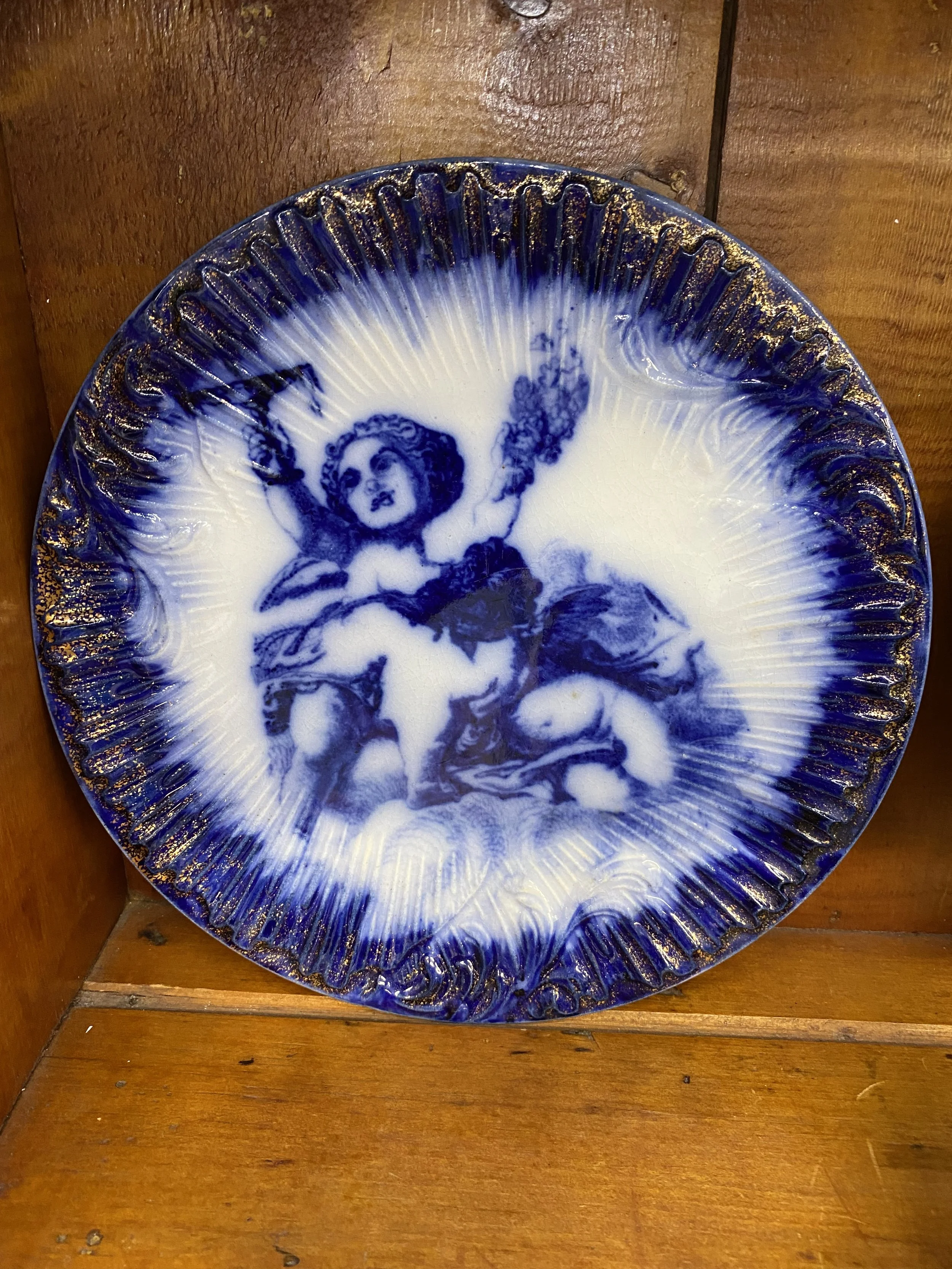 Porcelain flow blue plate