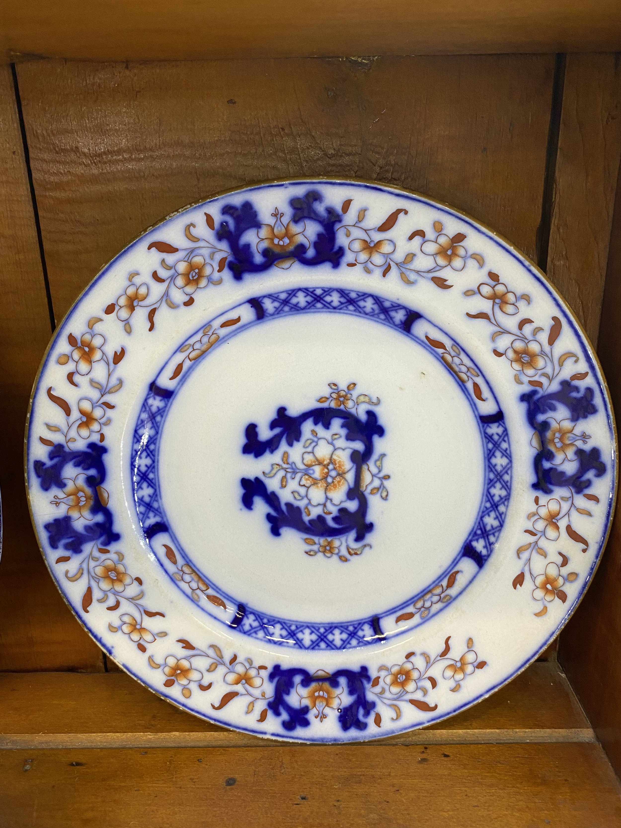Flow blue plate, rust accent