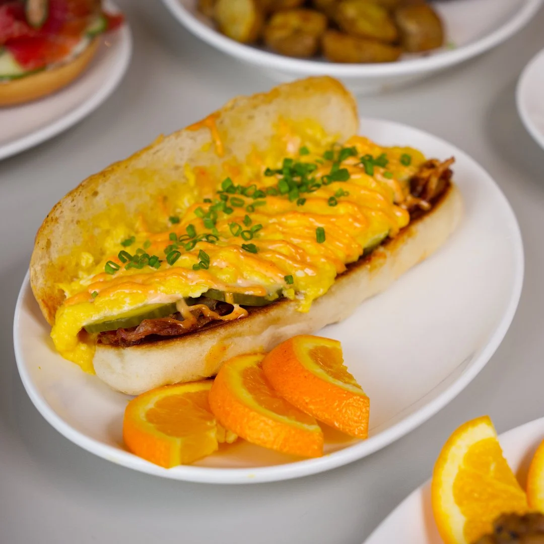 Scrambled egg, cheddar, gochujang aioli, and millionaire pickles on a soft bun (plus your choice of protein). we called it the breakfast hero for a reason 🦸&zwj;♂️ pair it with iced americano (cuts through that rich gochujang aioli perfectly)

Avail