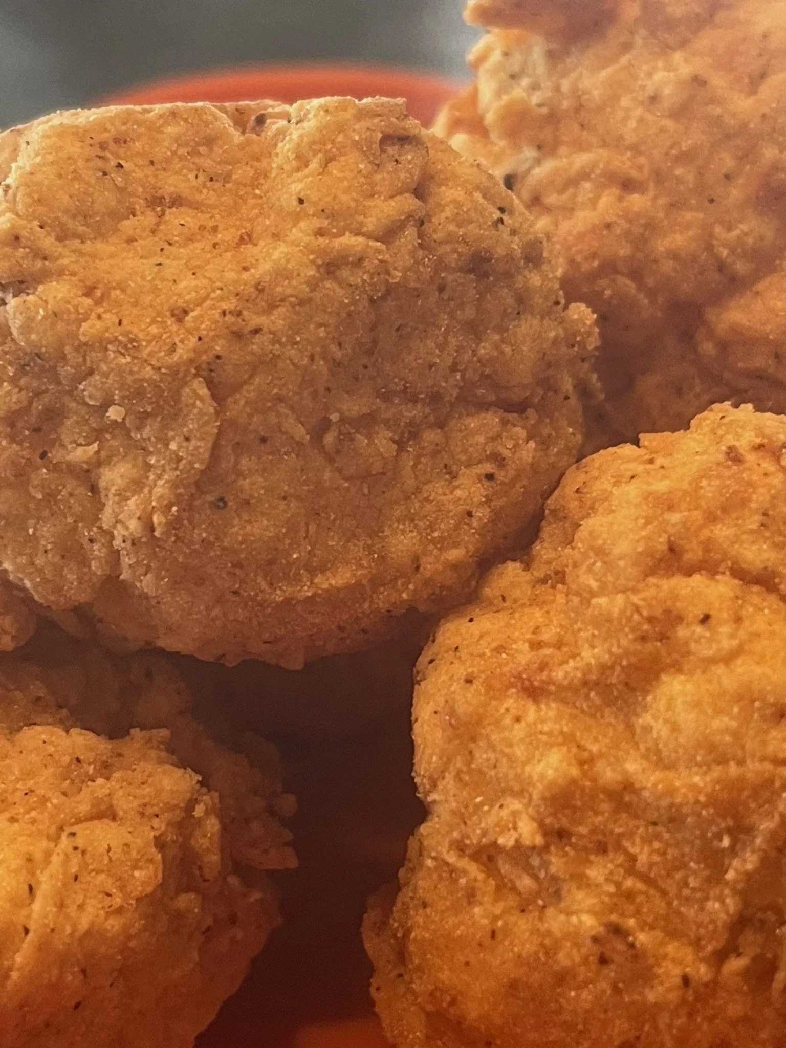 Crispy fried shrimp balls served golden brown with dipping sauce