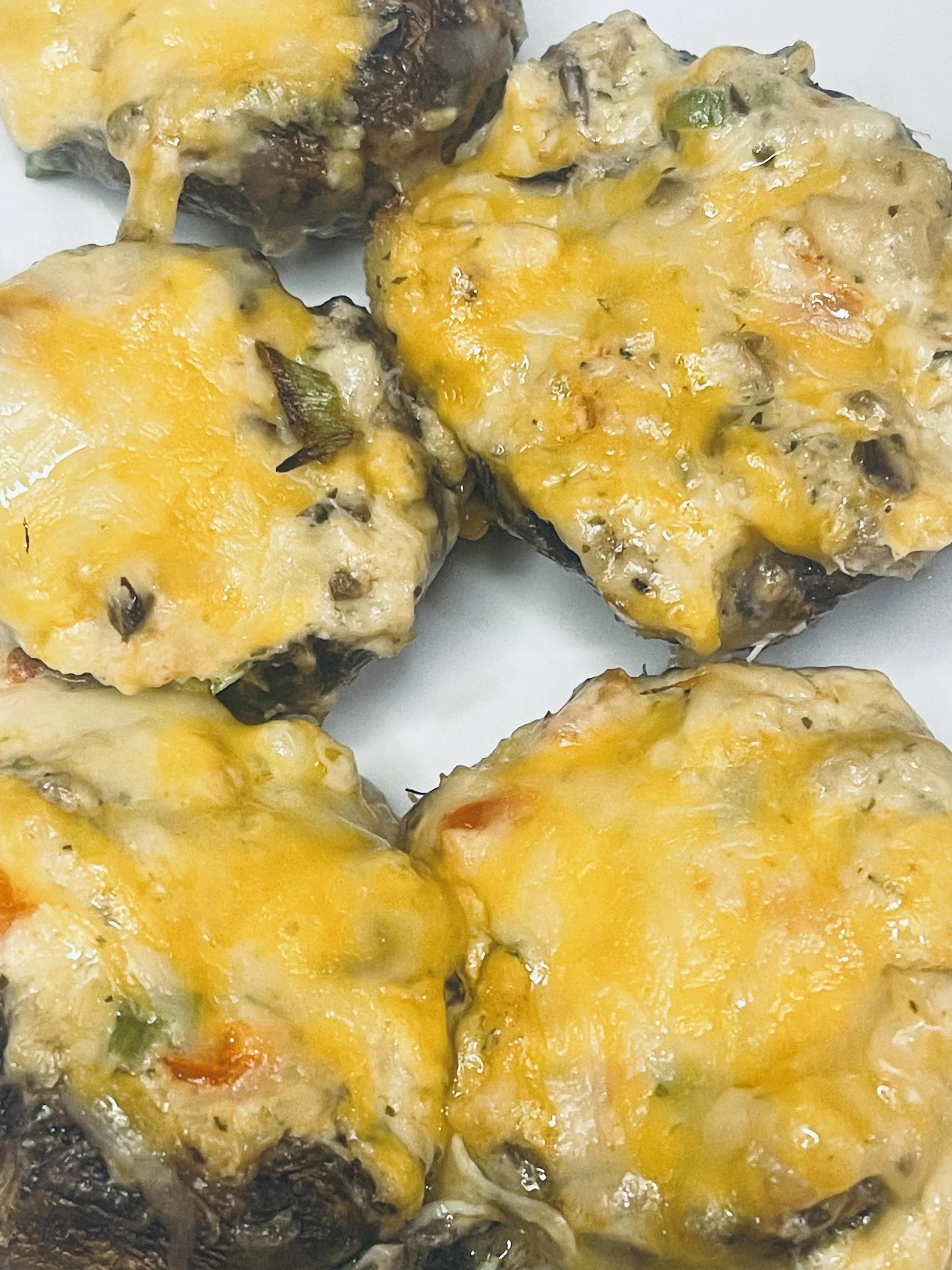 Savory shrimp and crab stuffed mushrooms baked with a creamy seafood filling and melted cheese for a rich, crowd pleasing appetizer