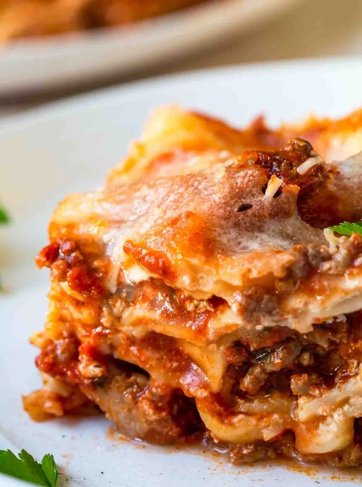 Hearty four-cheese lasagna layered with rich meat sauce, melted cheese, and tender pasta baked until golden and bubbly