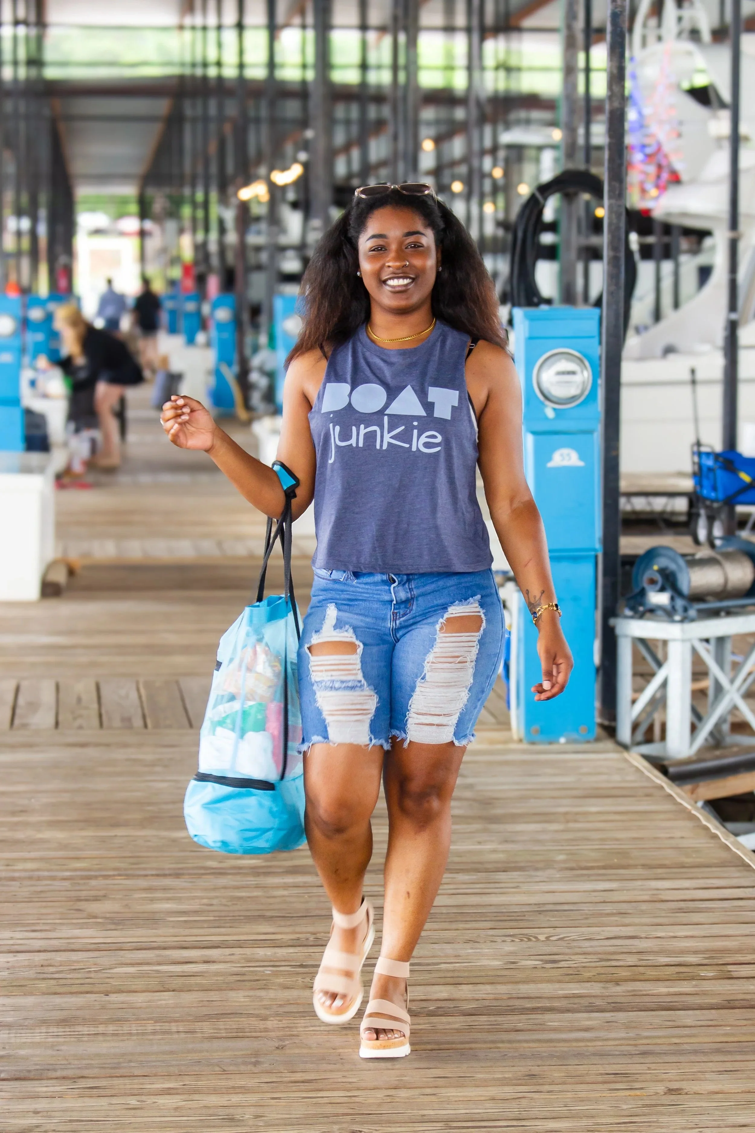 Blue mesh beach tote bag with separate bottom food compartment for snacks and drinks, ideal for lake trips, boating, beach days, and travel.