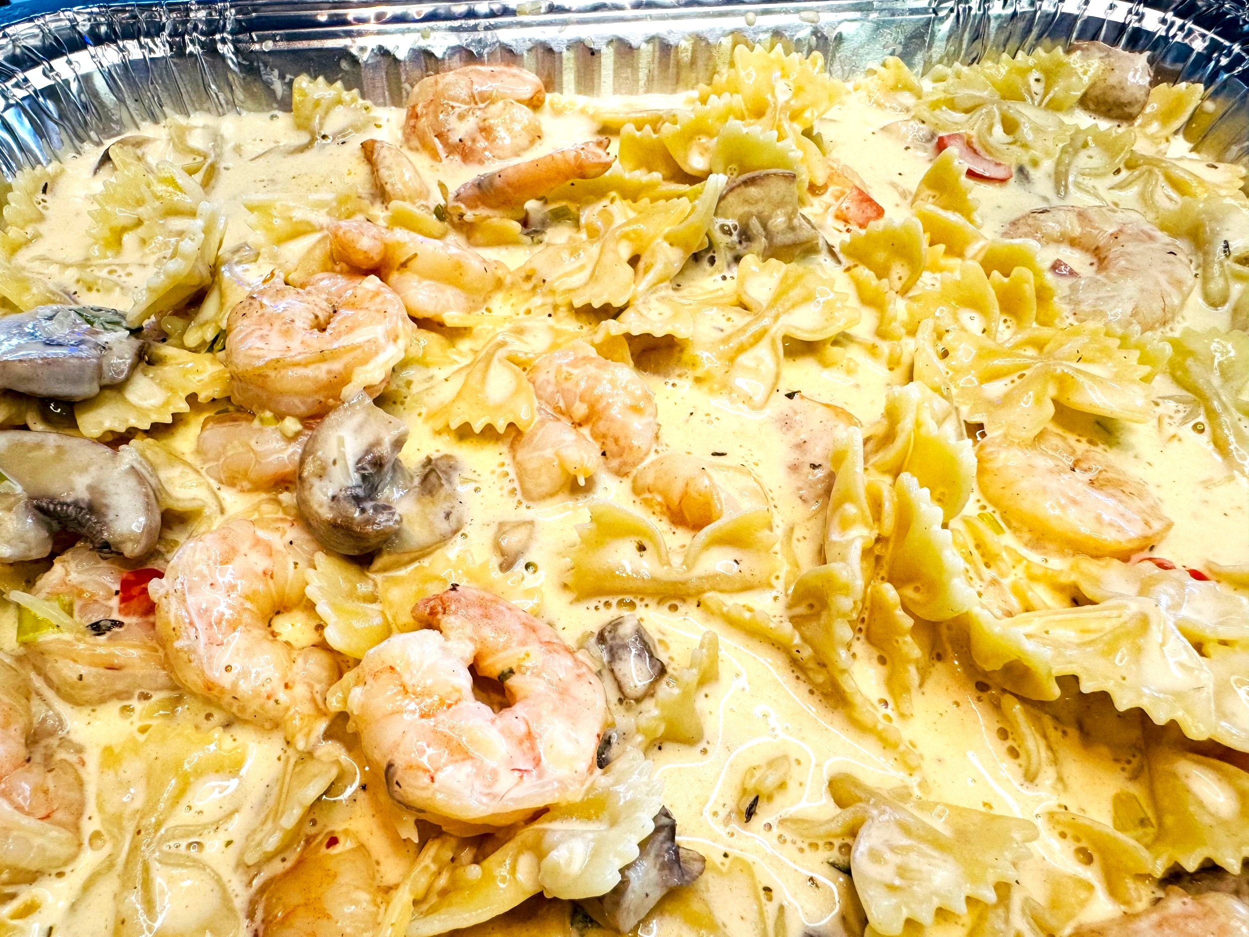 Rich and creamy chicken Alfredo pasta with garlic, parmesan, and fettuccine noodles.