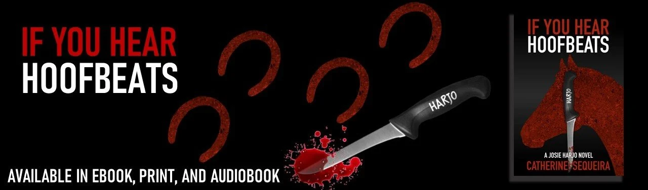 red hoofprints on a black background with a knife sitting in blood