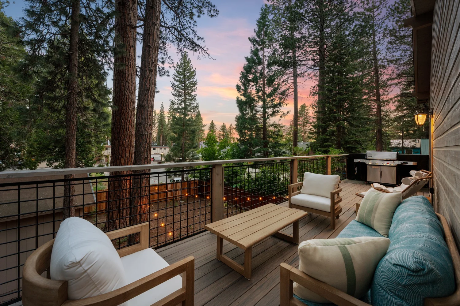 Vacation rental deck in the pines at sunset