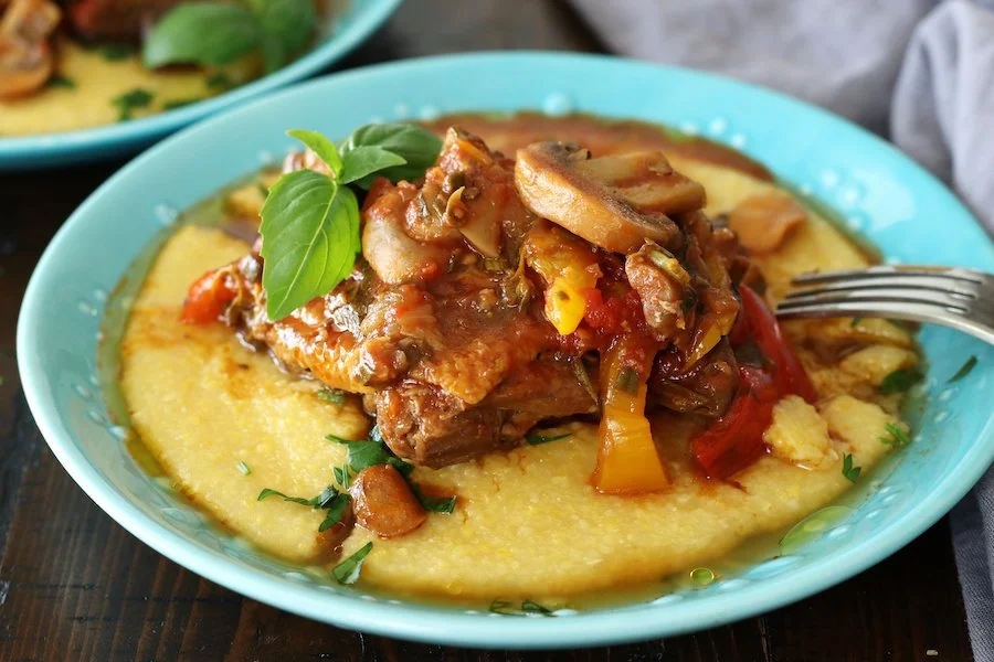 Chicken Cacciatore Slow Cooker Kit:Tender garlic & herb chicken thighs slow simmered in a rich tomato-Marsala sauce with mushrooms, peppers, onions and capers. Served with creamy polenta. Ready in 4–5 hours on low or 2–2½ hours on high.
