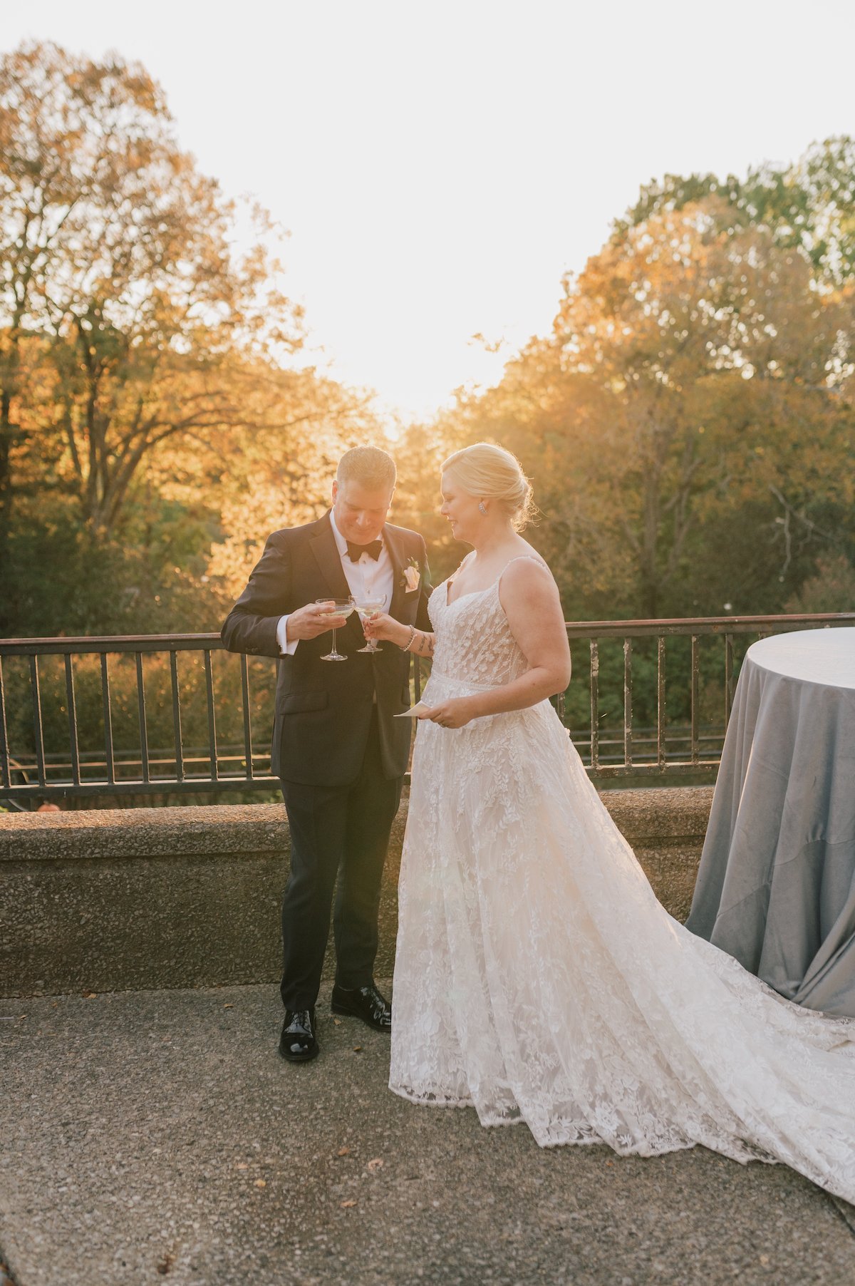 bride+and+groom+share+champagne+coups.jpeg