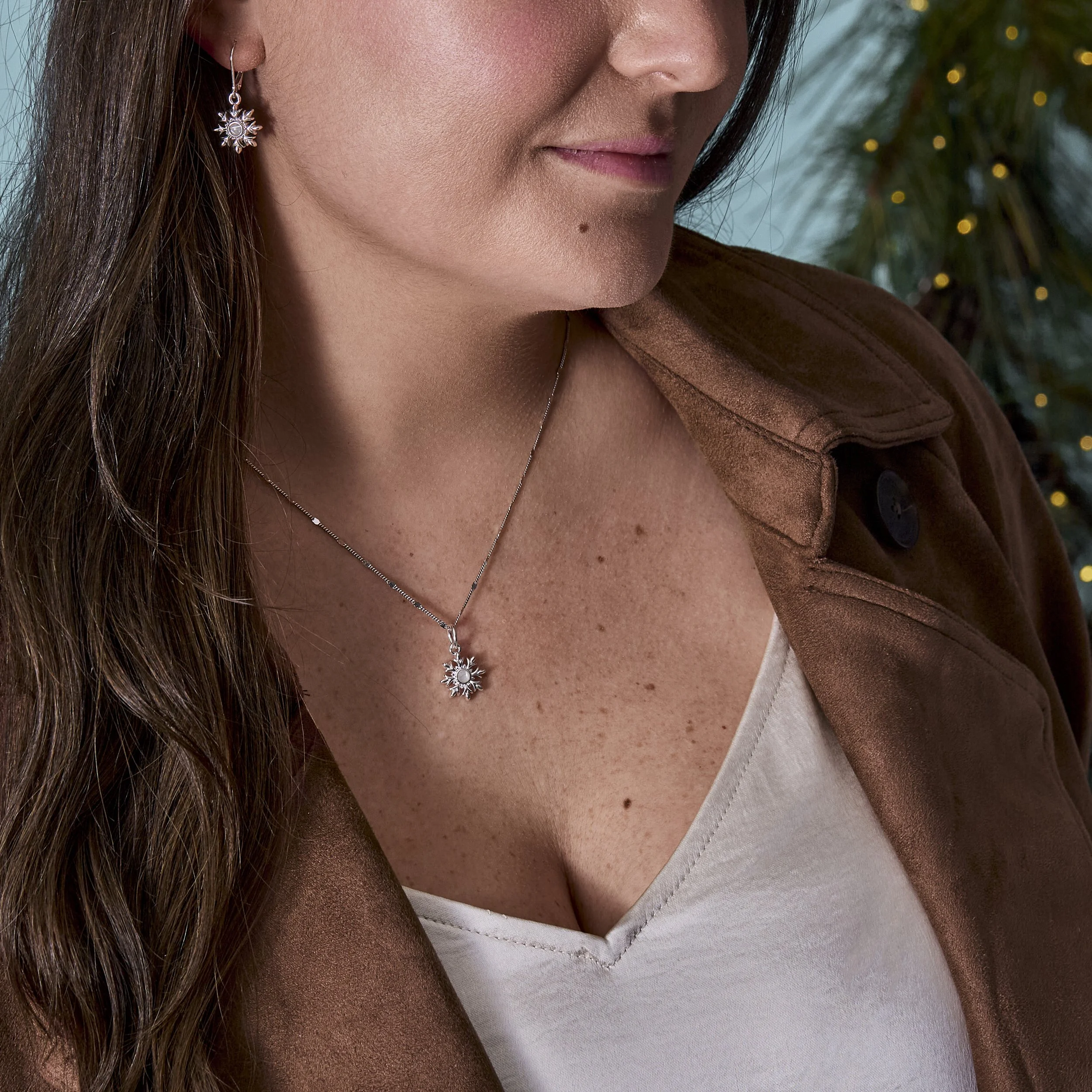LE-Snowflake-Necklace-Earrings-Perspective.jpg