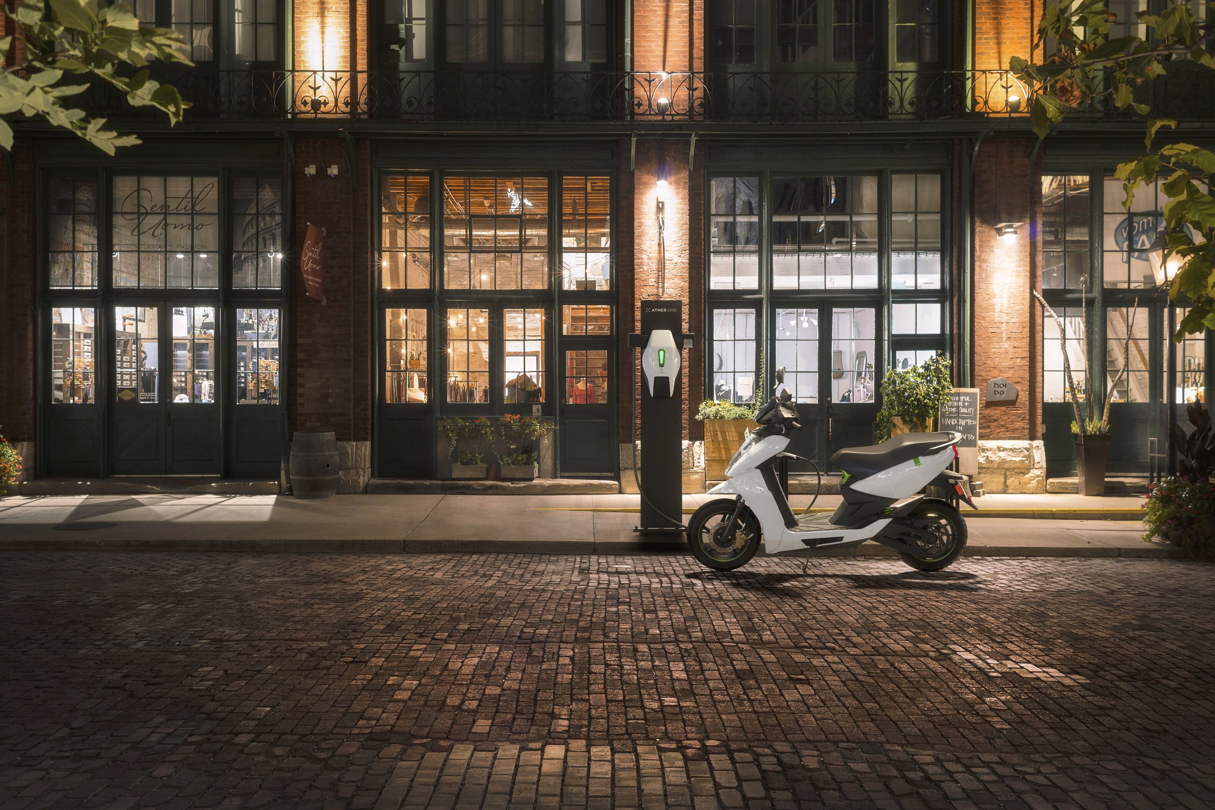 Ather_Charger_Pod_on_Background_Cafe_v01.jpg