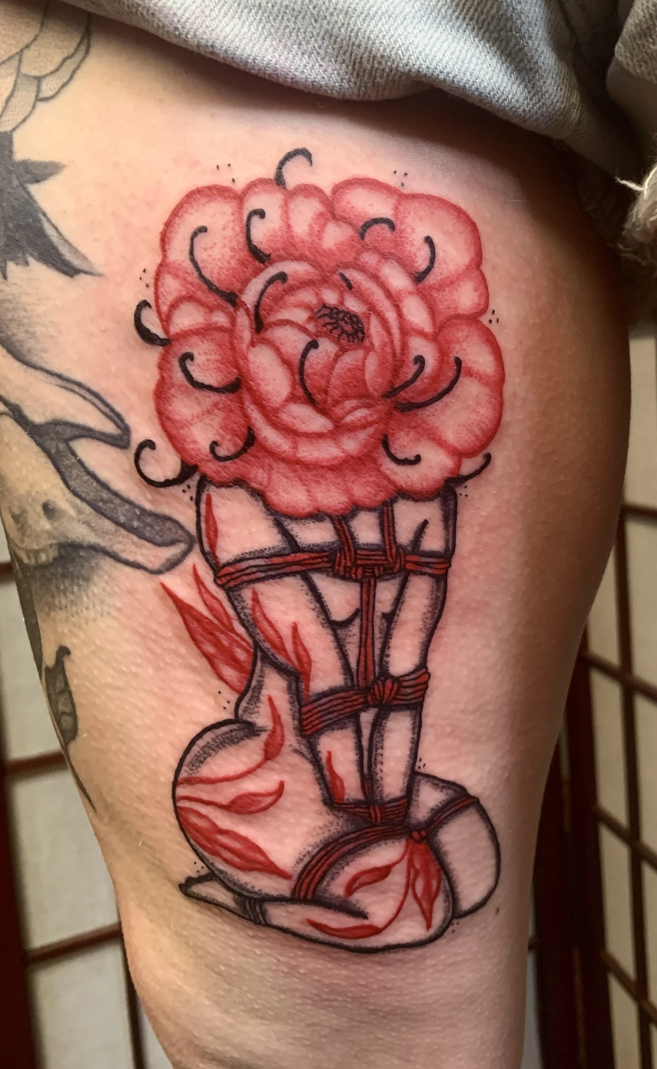 A surreal Shibari color tattoo.