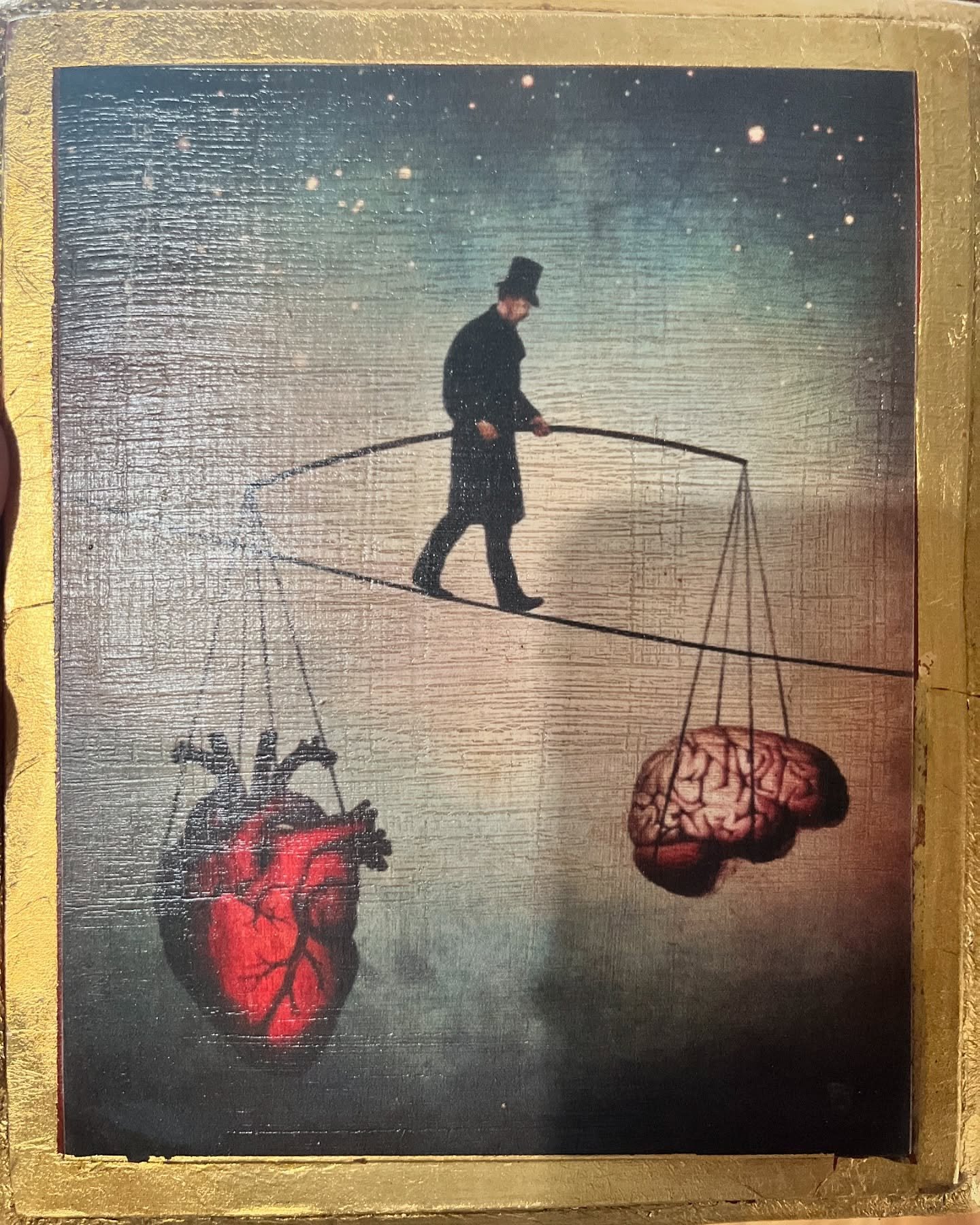 My mom brought me that little tableau from@her trip to Mexico. And that&rsquo;s my tattoo I got this fall. The painting is by Christopher Schloe. I&rsquo;d seen a version of this when I was choosing the design, but with a little stick figure girl wit