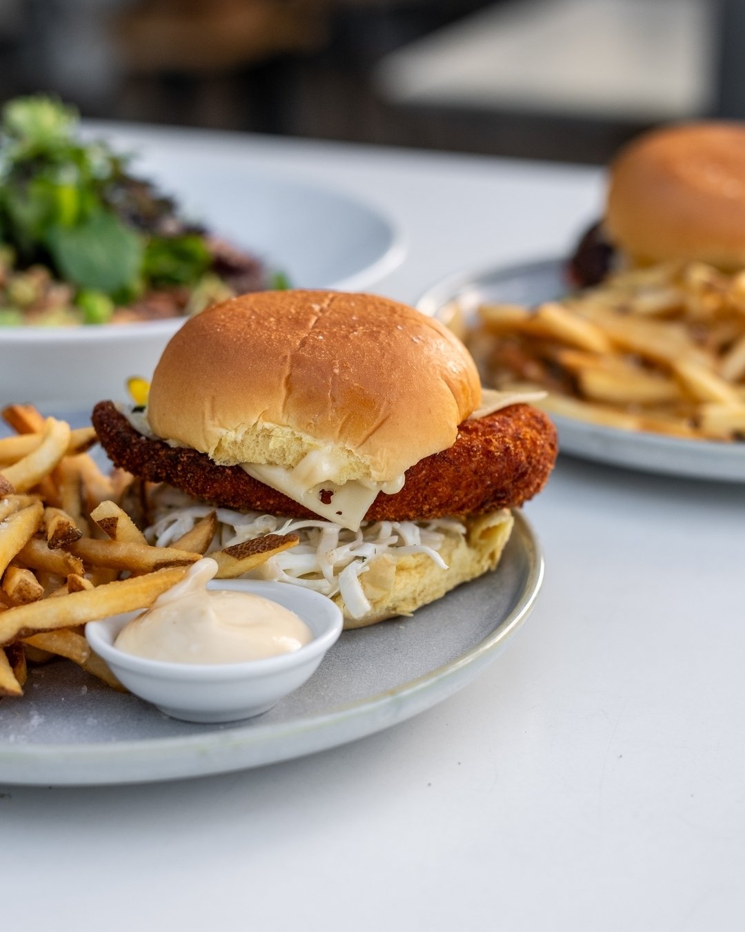 PARMESAN PANKO CHICKEN SCHNITZEL BURGER. potato bun. swiss cheese. celeriac &amp; cabbage slaw. zucchini pickle. herb mayo + fries.
 
 
 
 
 
 
 
 
 
 
 
 
 
 
 
 
 
#nextdoor #nextdoorcronulla #cafecronulla #cronulla #cronullabreakfast #sutherlandsh