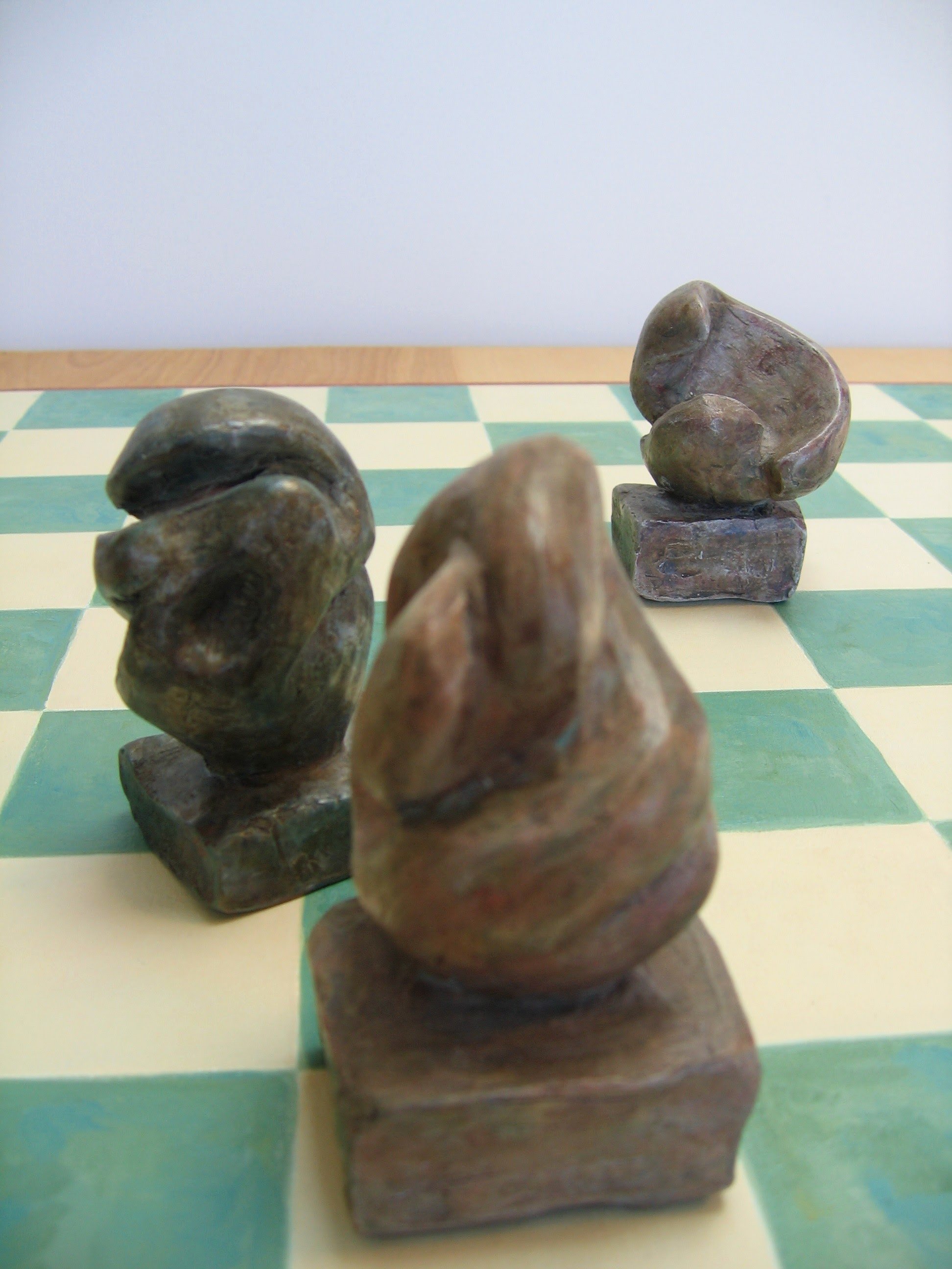 Checkerboard Sculptures (1995) View 6, Clay w/Patina (Range in size 3"- 5")