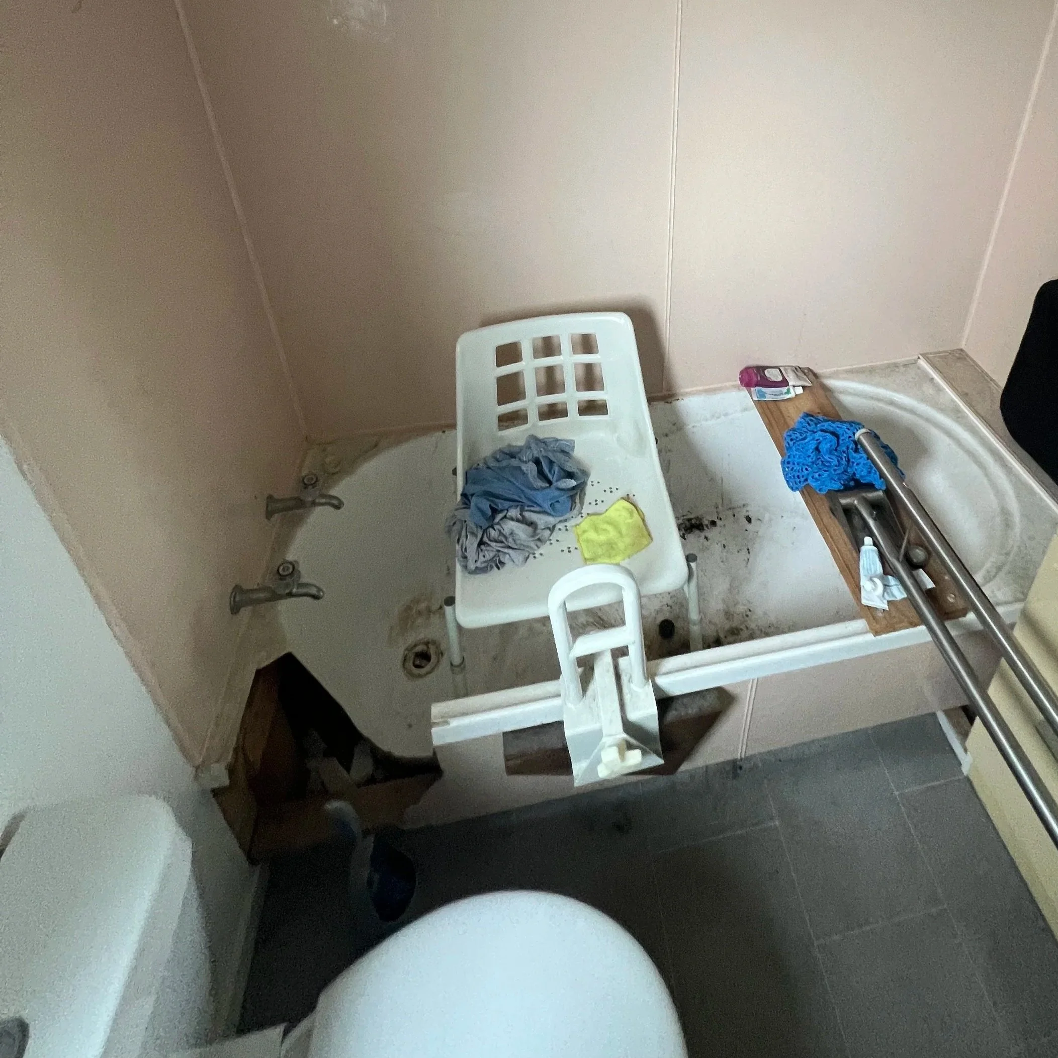 old bathtub with section cut away
