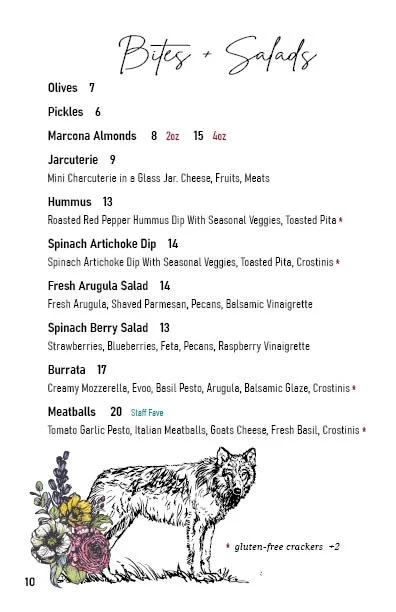 Menu page titled "Bites + Salads" listing various appetizers and salads with their prices and descriptions, including olives, pickles, Marcona almonds, jarcuterie, hummus, spinach artichoke dip, fresh arugula salad, spinach berry salad, burrata, and meatballs. Contains a decorative illustration of a wolf with flowers at the bottom left corner.