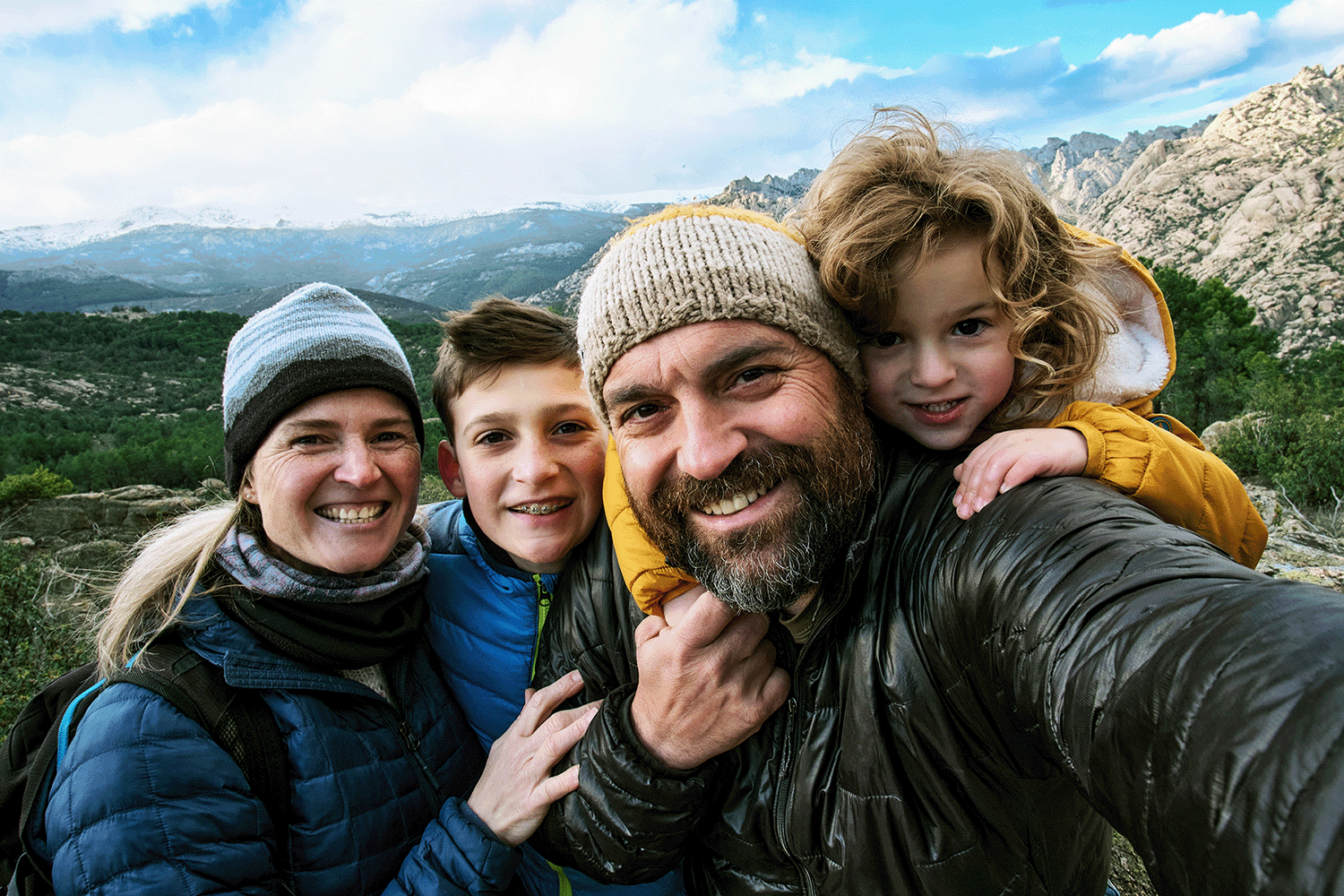 family selfie in the mountains