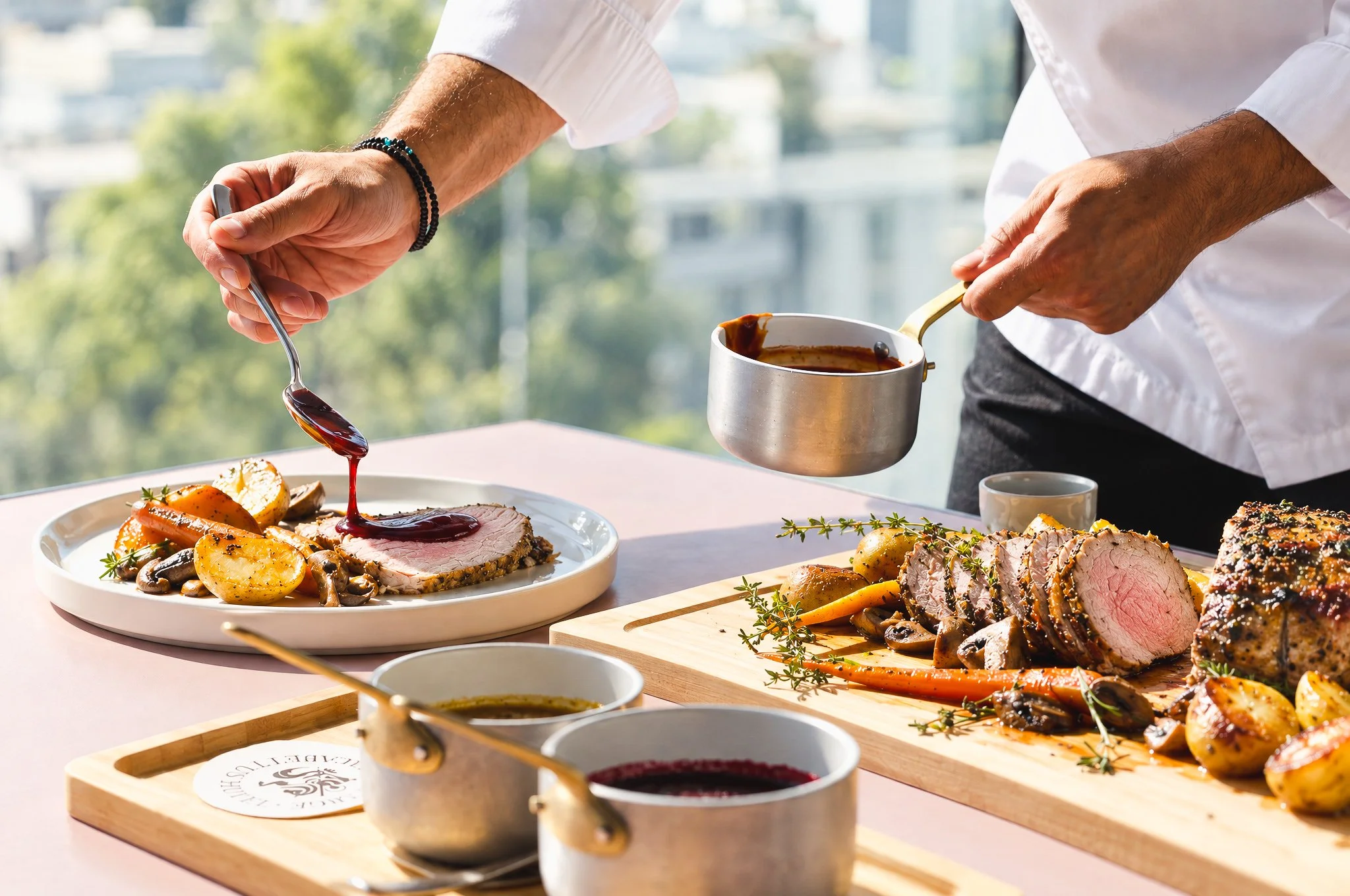 Our head chef serving sunday brunch at La Suite Hotel Restaurant, with a view of Athens, Lycabettus and the Acropolis. 
