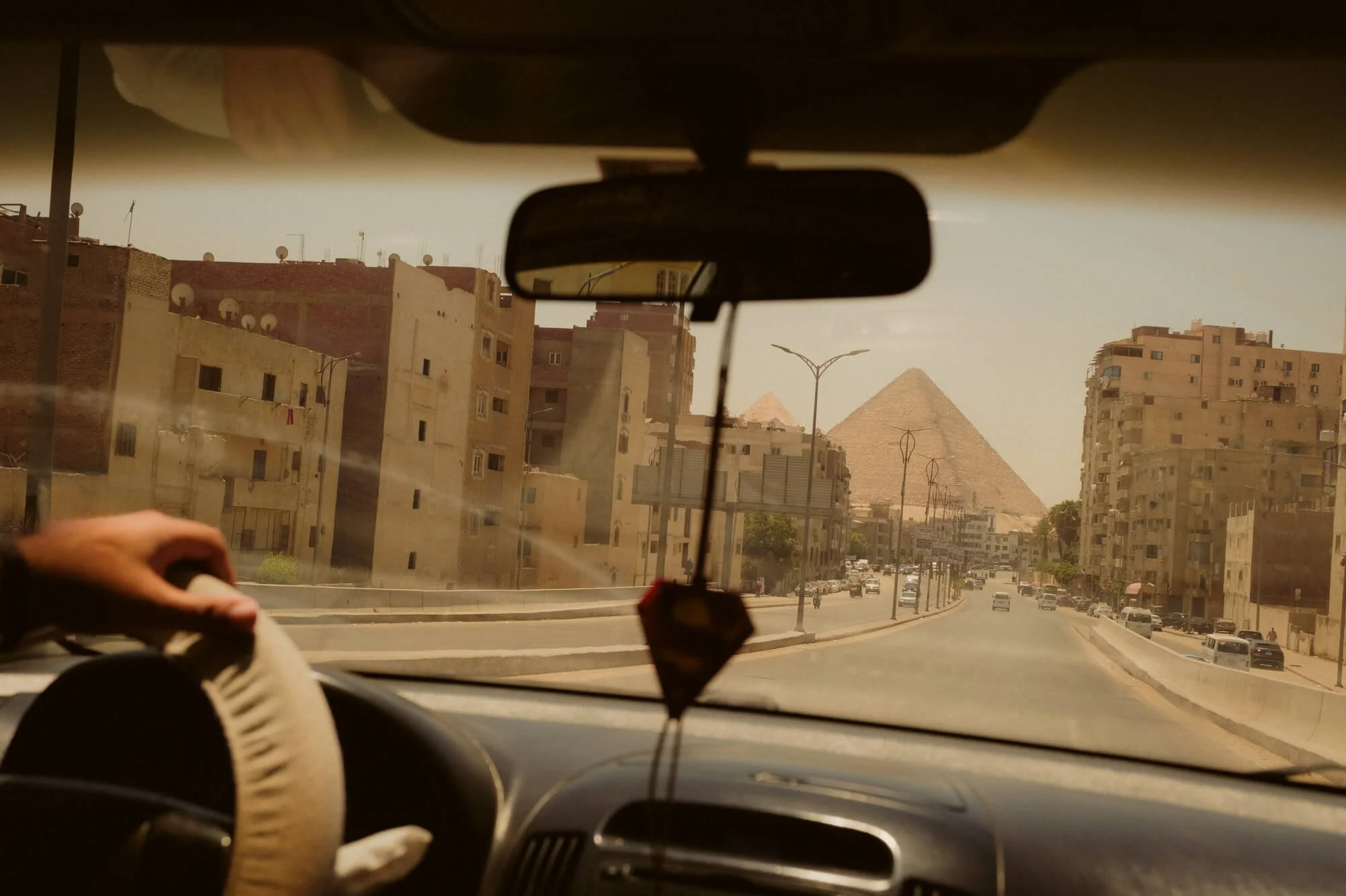 car-pyramids-giza.jpg