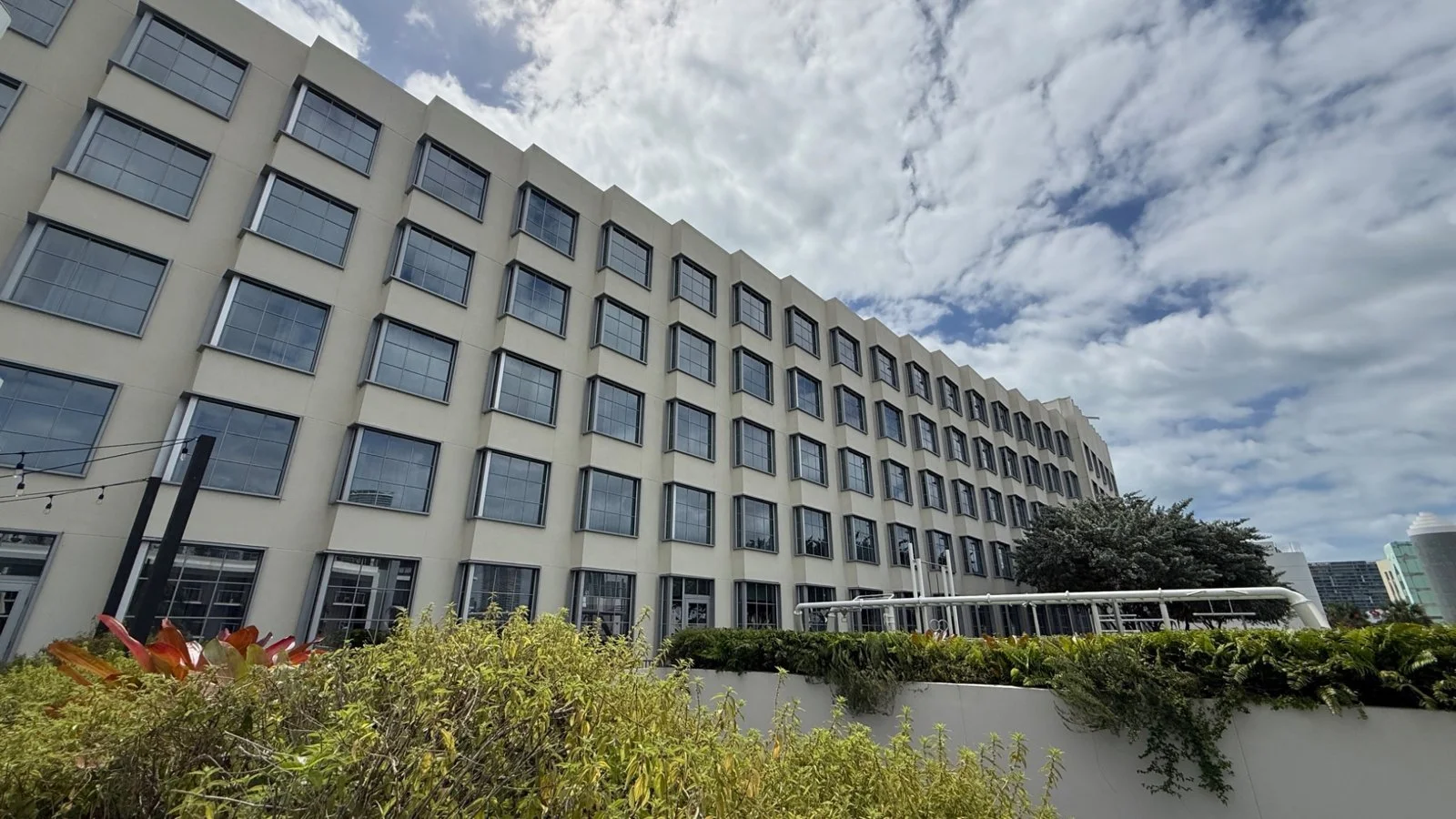 Exterior view of The Goodtime Hotel Miami building with geometric windows and landscaped terrace