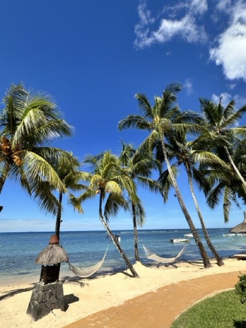 The_Oberoi_Mauritius_Blue_Sky.jpeg