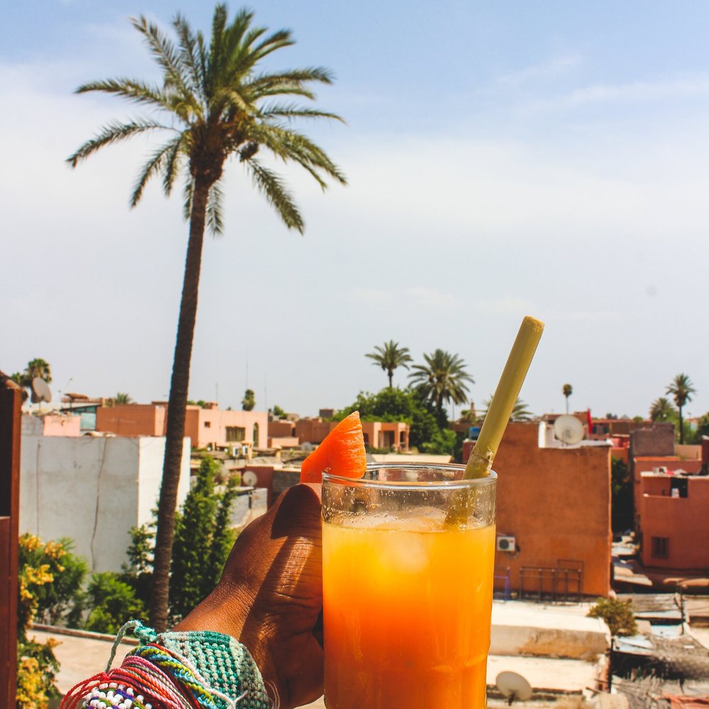 orange-juice-medina-view-palm-tree-marrakesh-morocco-theprivatetraveller.jpg