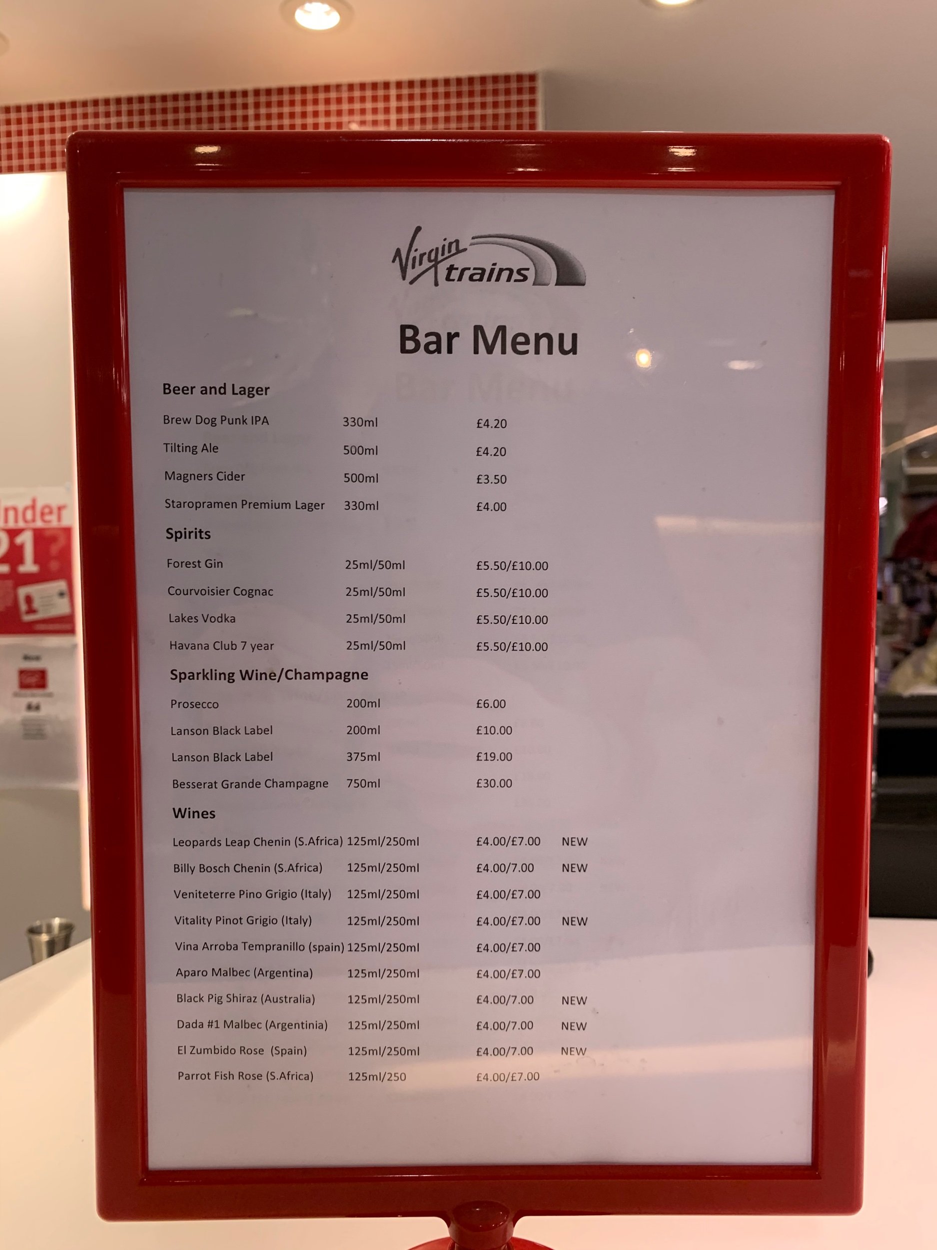 Bar menu outlined in red board - drinks price list
