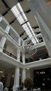 Raffles-Hotel-Singapore-Atrium.jpeg