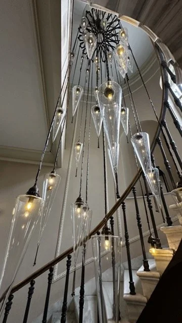 elegant_staircase_glass_chandelier.jpeg