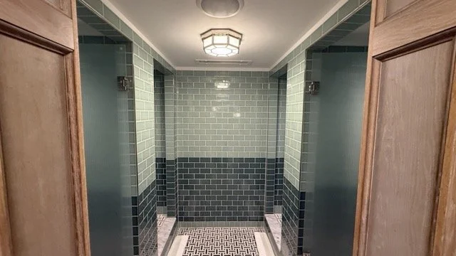 gleneagles-townhouse-spa-showers-green-tiles.jpeg