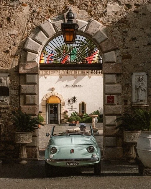 four-seasons-taormina-entrance-vintage-fiat-500.jpeg