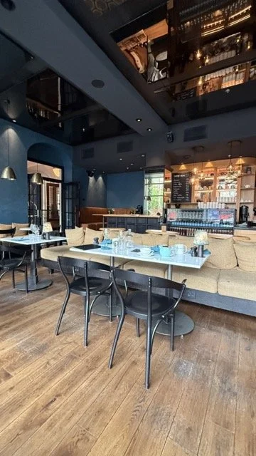 amerikalinjen-cafe-blue-interior-breakfast-setting.jpeg