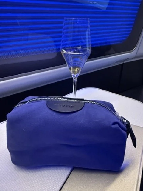british-airways-first-class-amenity-kit-and-champagne.jpeg