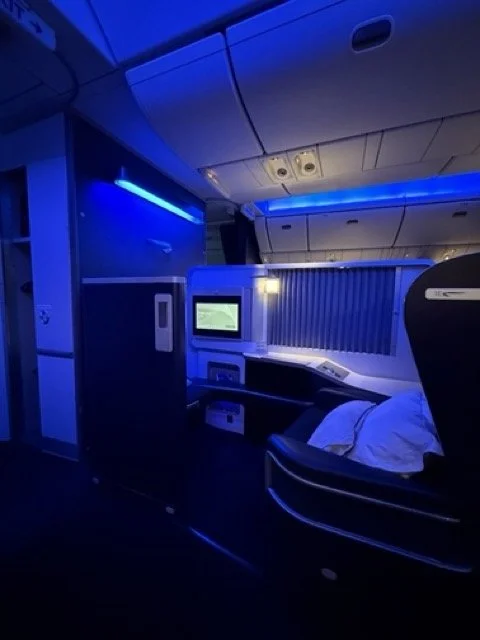 british-airways-first-class-cabin-blue-lighting-overview.jpeg