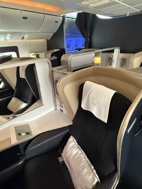 british-airways-first-class-seat-detail-armrest-and-lighting.jpeg
