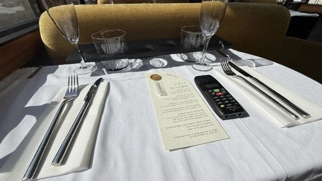 le-grand-luxury-bus-dining-table-setting.jpeg