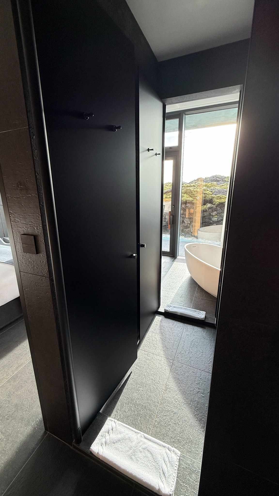 blue-lagoon-iceland-bathroom-black-door-design.jpeg