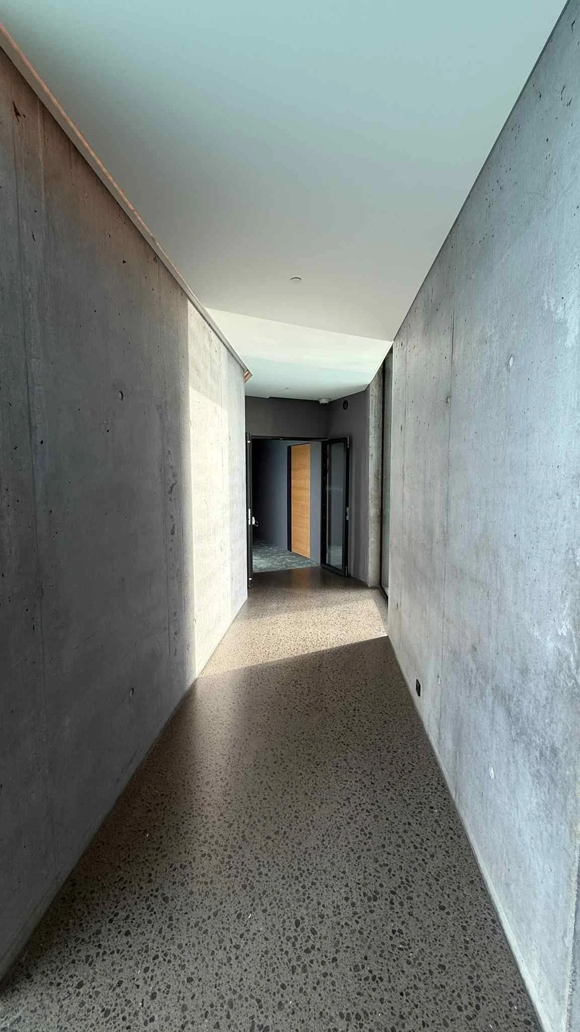 the-retreat-hotel-blue-lagoon-iceland-concrete-hallway.jpeg