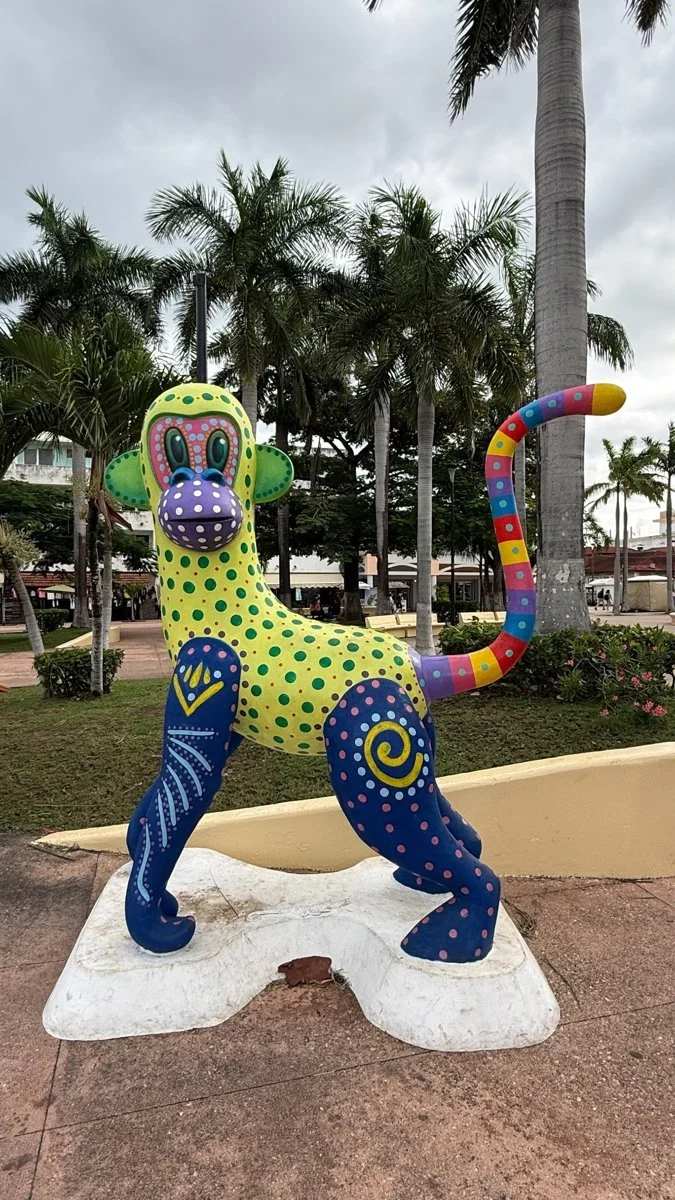 cozumel-colourful-monkey-sculpture.jpg