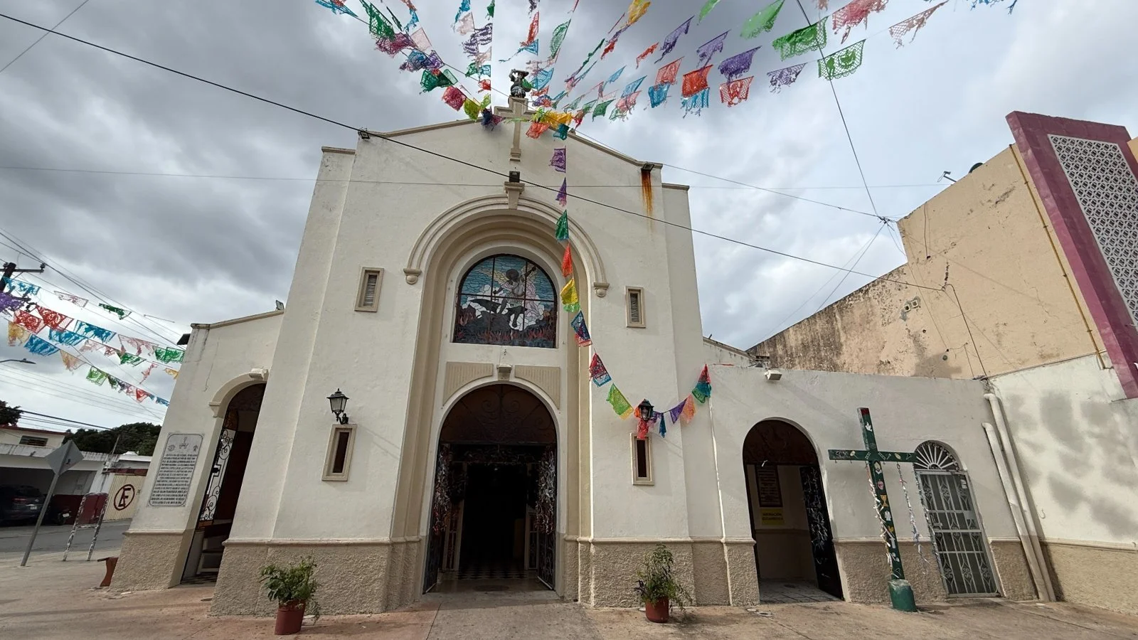 cozumel-church-colourful-flags.jpg