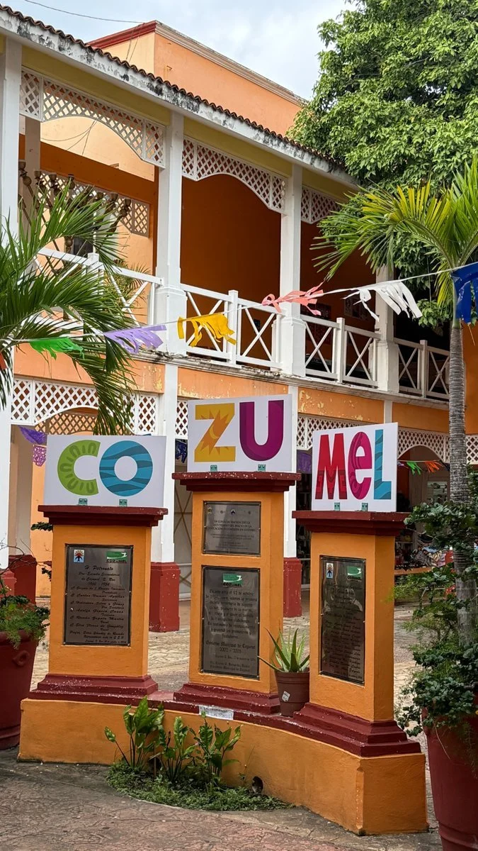 cozumel-colourful-sign-orange-building.jpg