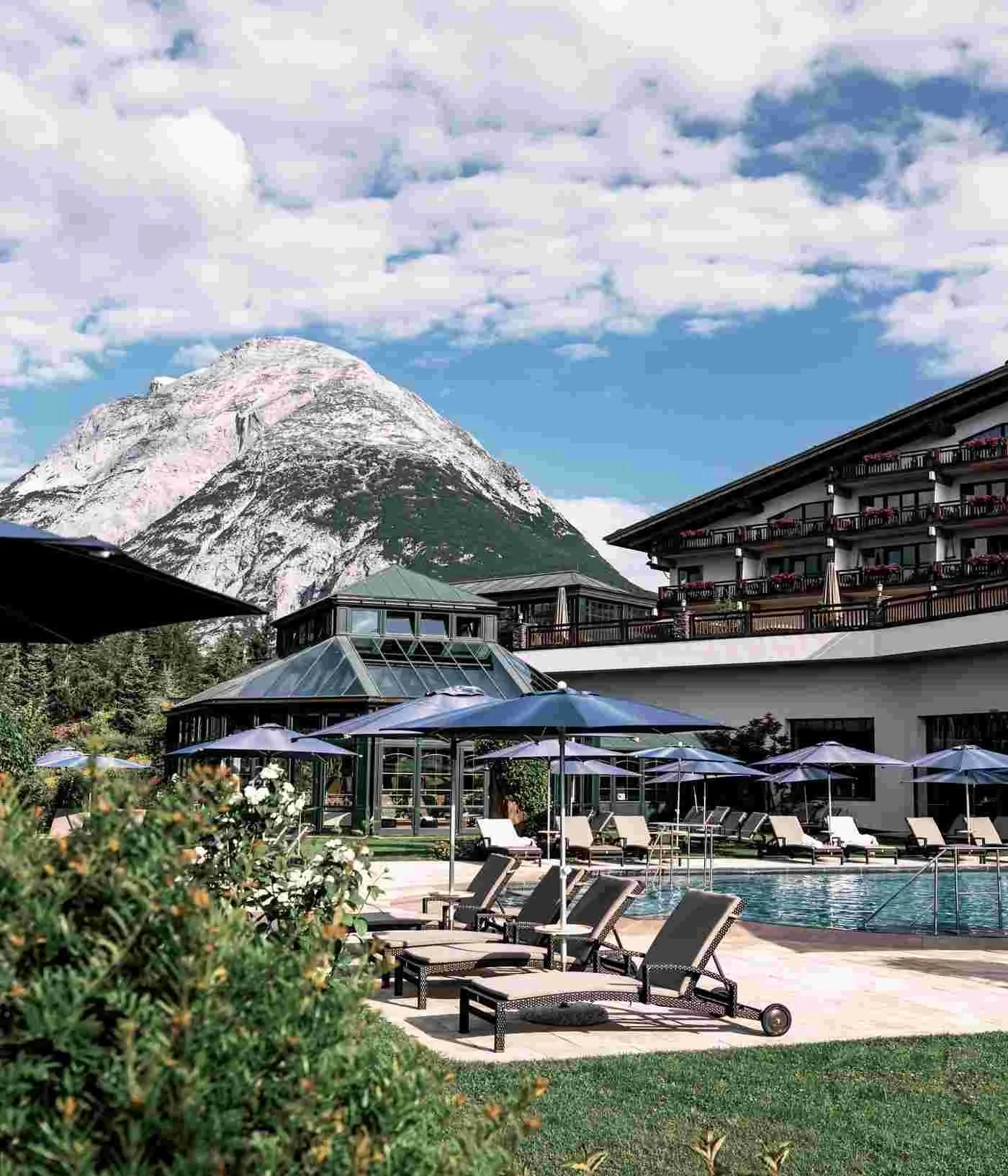 interalpen-hotel-tyrol-pool-mountain-view.jpg