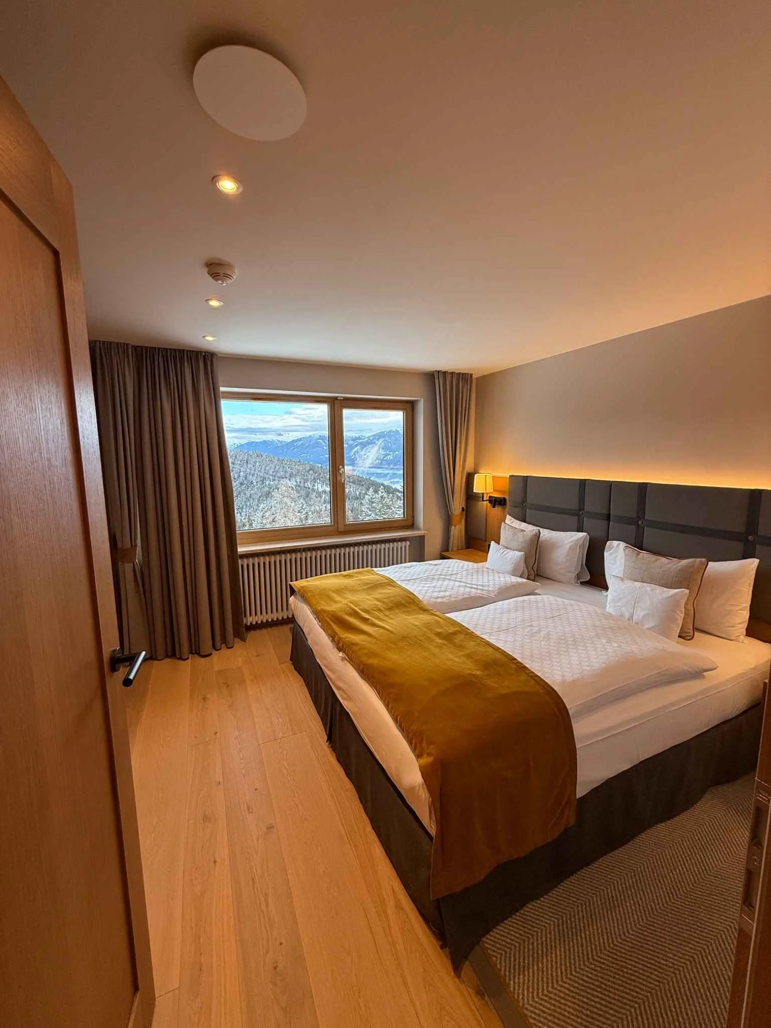 interalpen-hotel-tyrol-modern-deluxe-bedroom-alpine-view.jpg