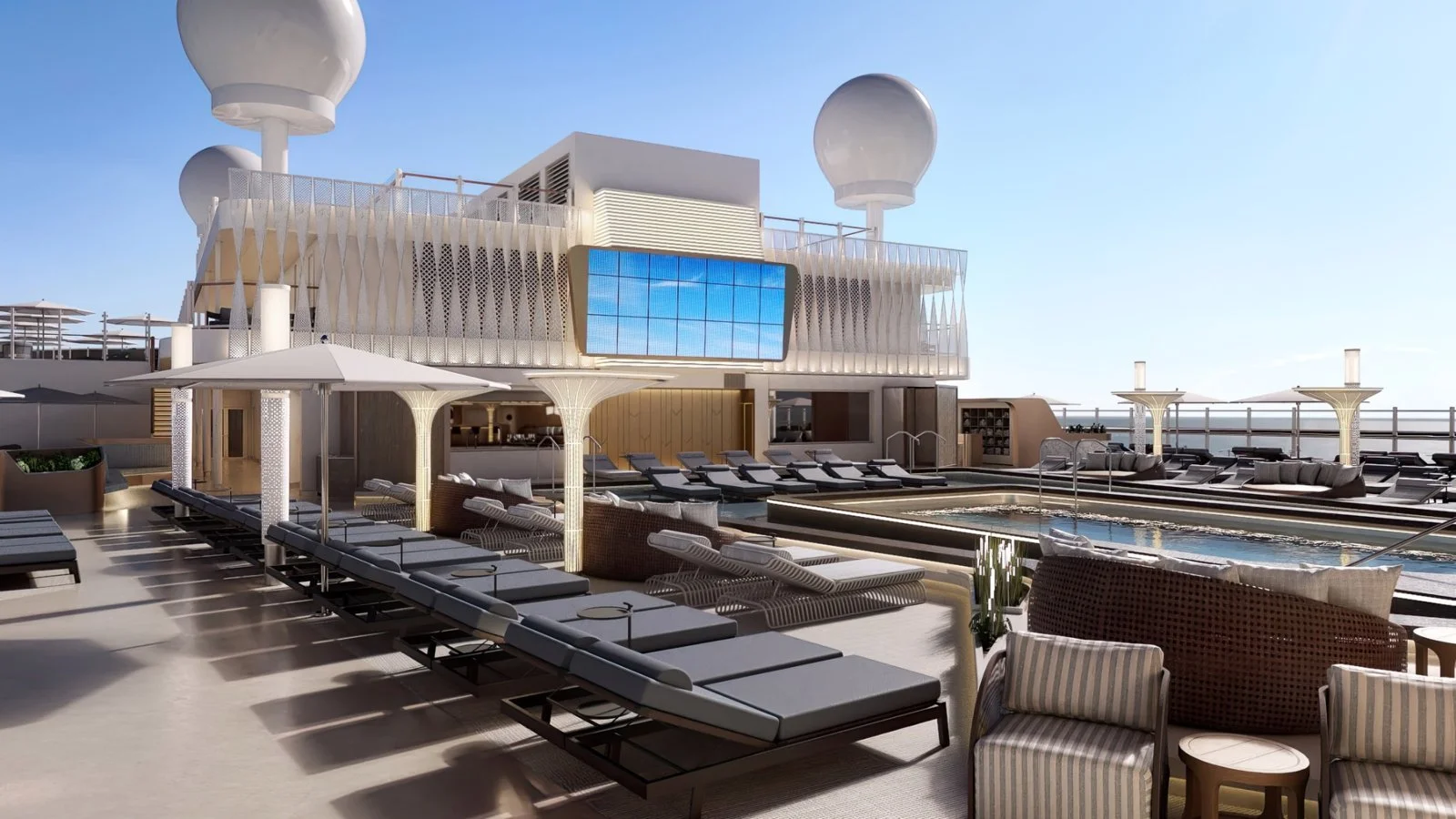 Main pool deck on Norwegian Luna with sun loungers, cabanas and modern outdoor design
