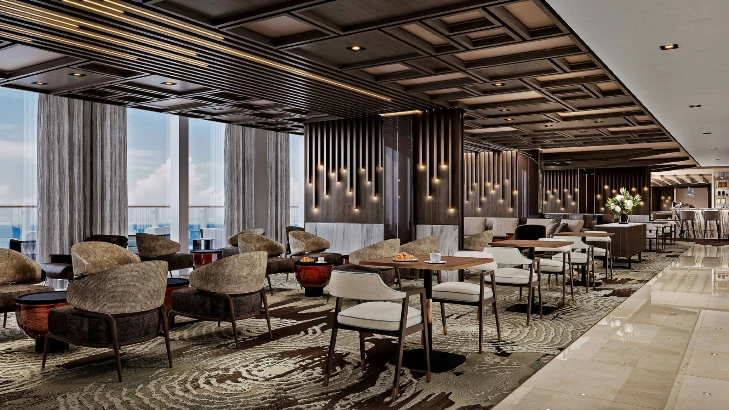 Elegant interior of Crema Café aboard Explora III, the luxury cruise ship's stylish coffee lounge serving speciality coffee, pastries and light refreshments throughout the day.