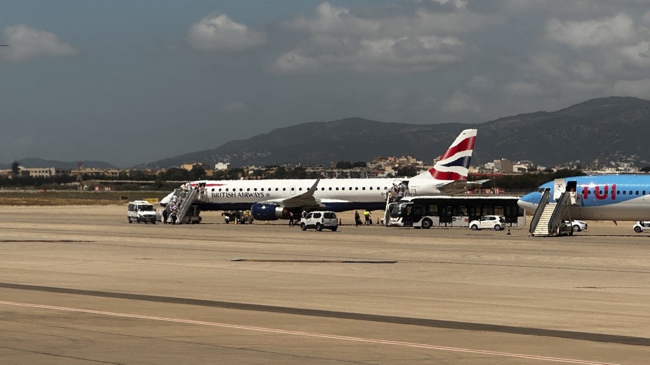 Embraer CityFlyer aircraft on the runway at Palma International Airport